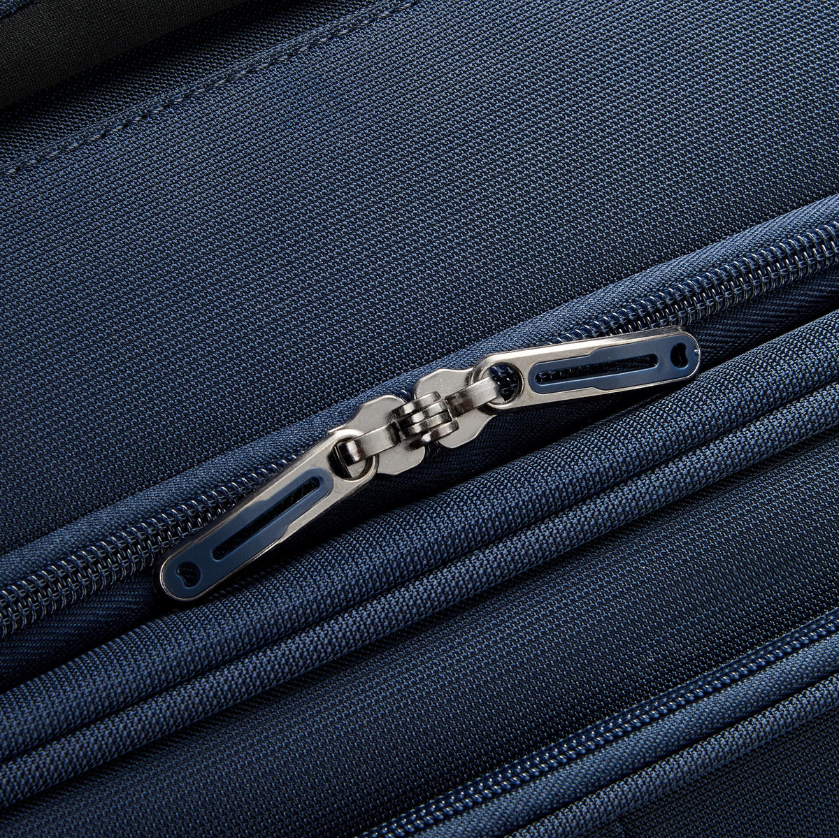 Delsey Helium DLX - Carry-On Plus Expandable Spinner - Navy