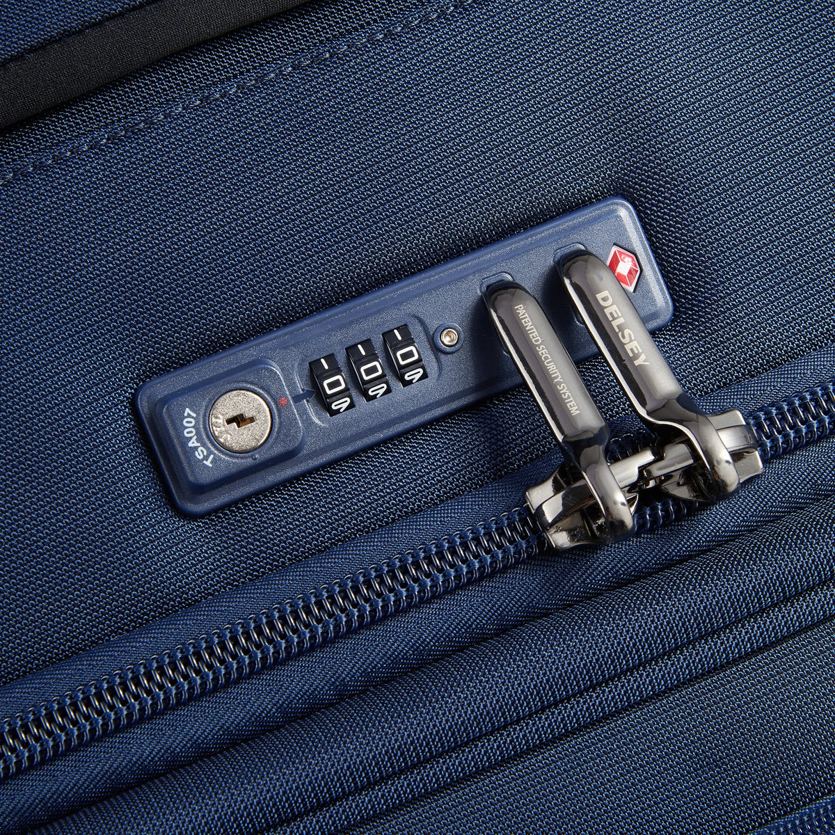 Delsey Helium DLX - Medium Expandable Spinner - Navy