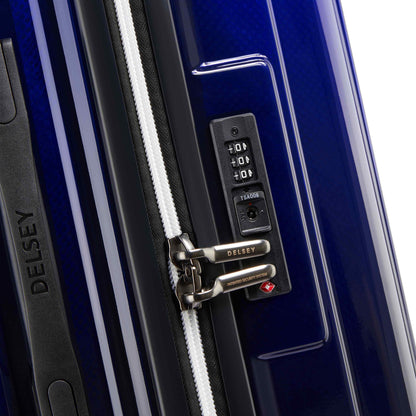 Delsey Rempart - Translucent Medium Trunk Expandable Spinner - Translucent Blue