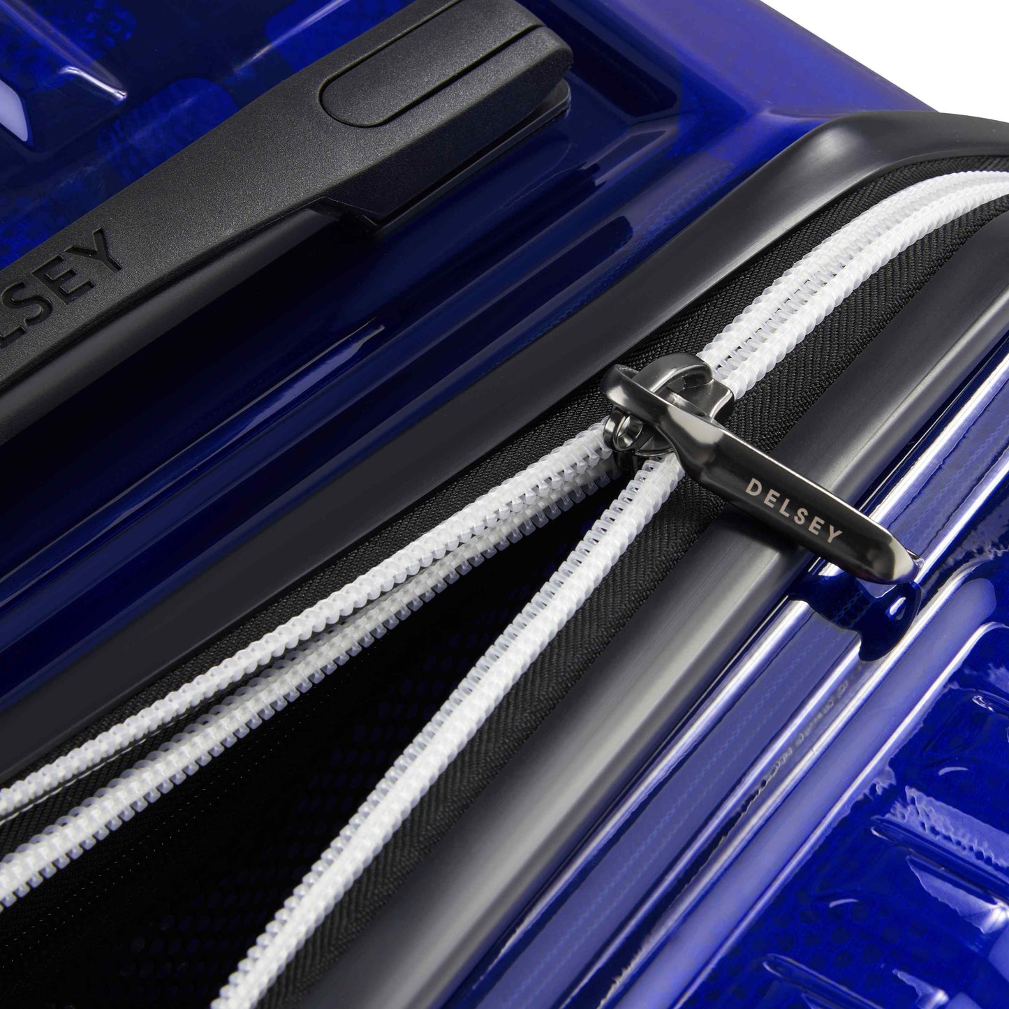 Delsey Rempart - Translucent Medium Trunk Expandable Spinner - Translucent Blue